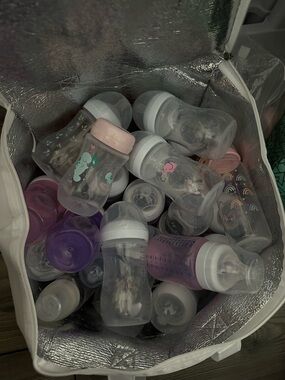 Brand new baby bottles and nipples